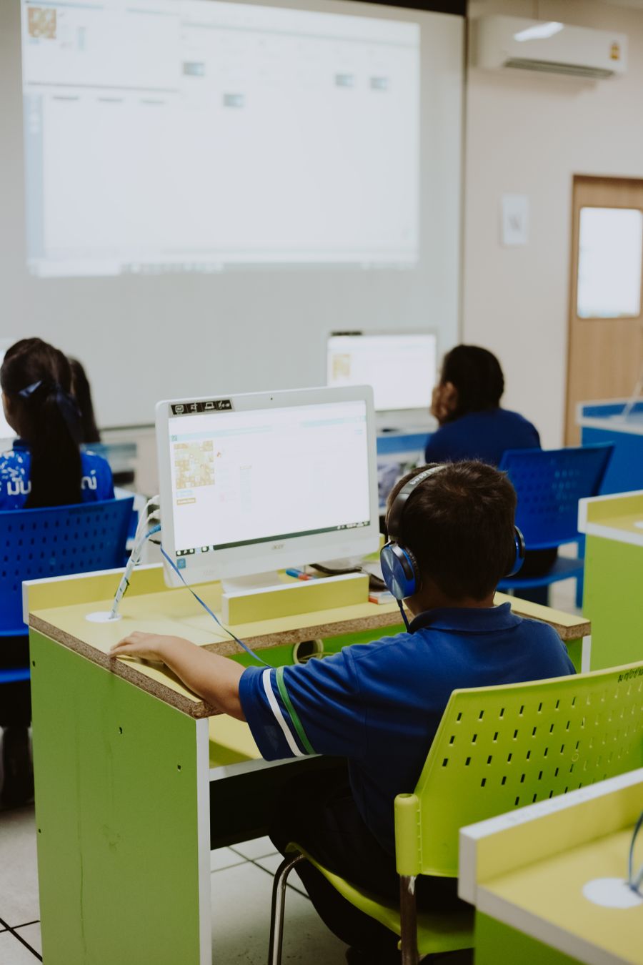 Students working on computers in a school computer lab