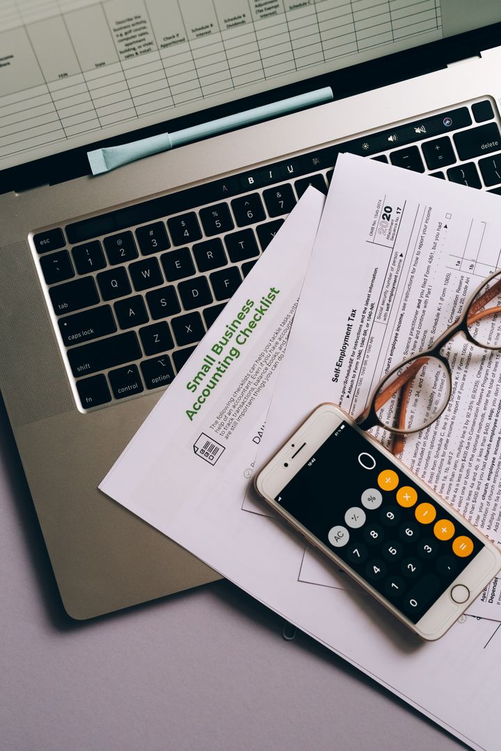 Person reviewing financial records and documents