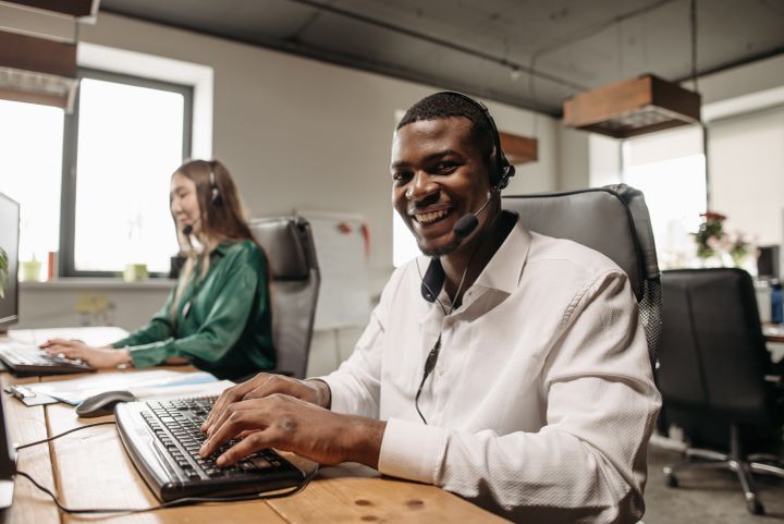 Customer support team in an office handling customer enquiries